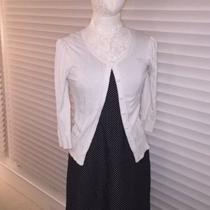 White cardigan with bejeweled buttons